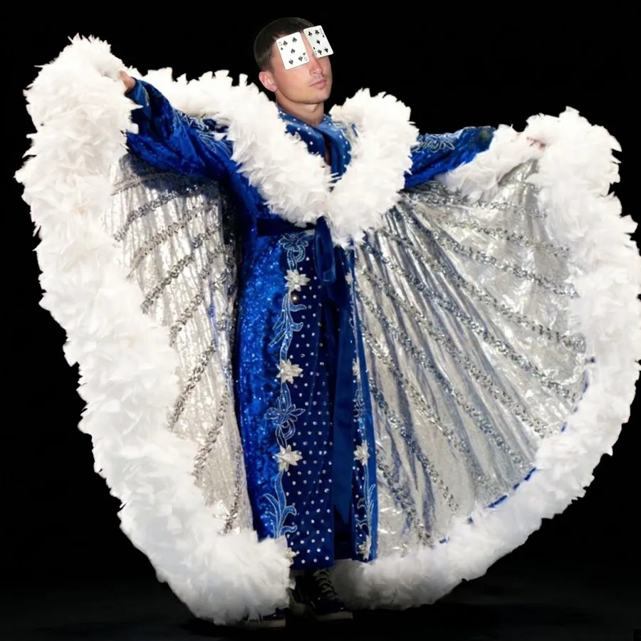 Ty Stav, the Pimp of SEO, in a blue feathered wrestling robe